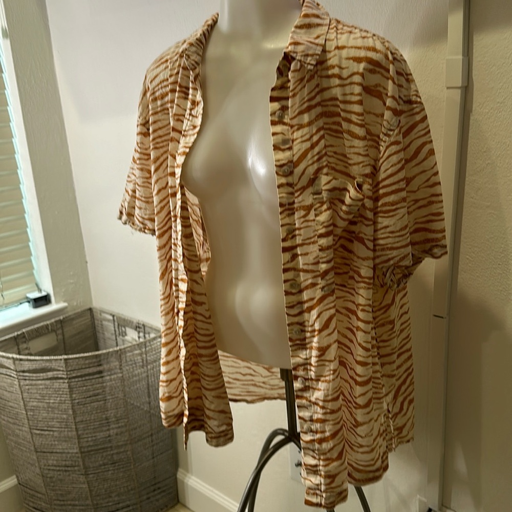 Rust and white zebra print button up blouse